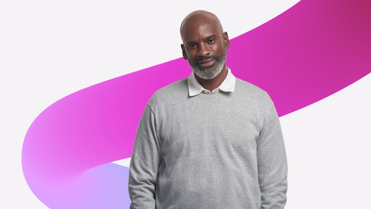 Portrait of a person standing, looking at the camera, with a magenta graphic design squiggle in the background.