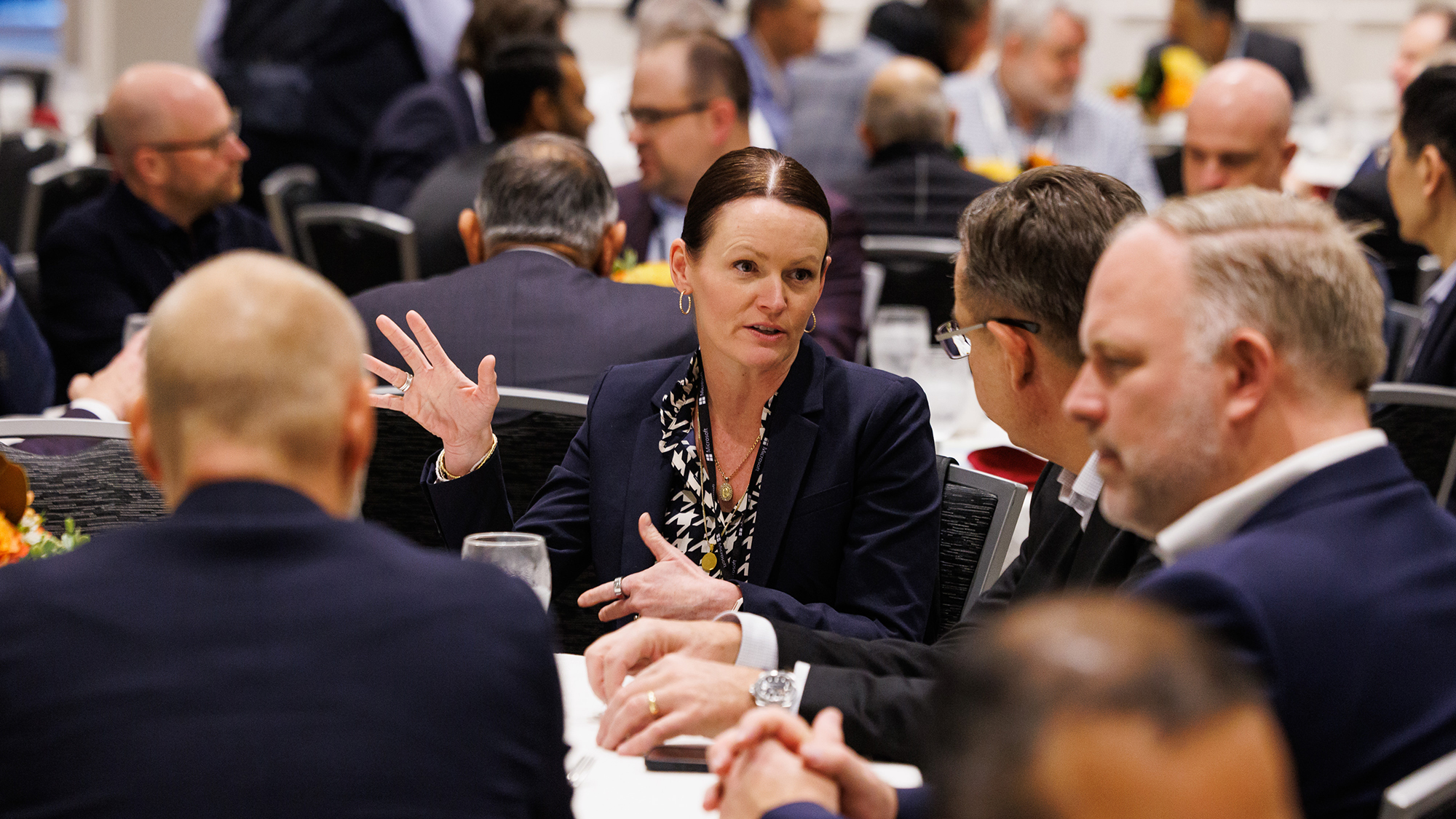 A group of people sitting at a table