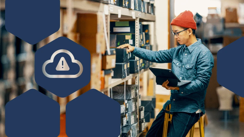 Retail shop worker using a digital tablet checks inventory in a storage room